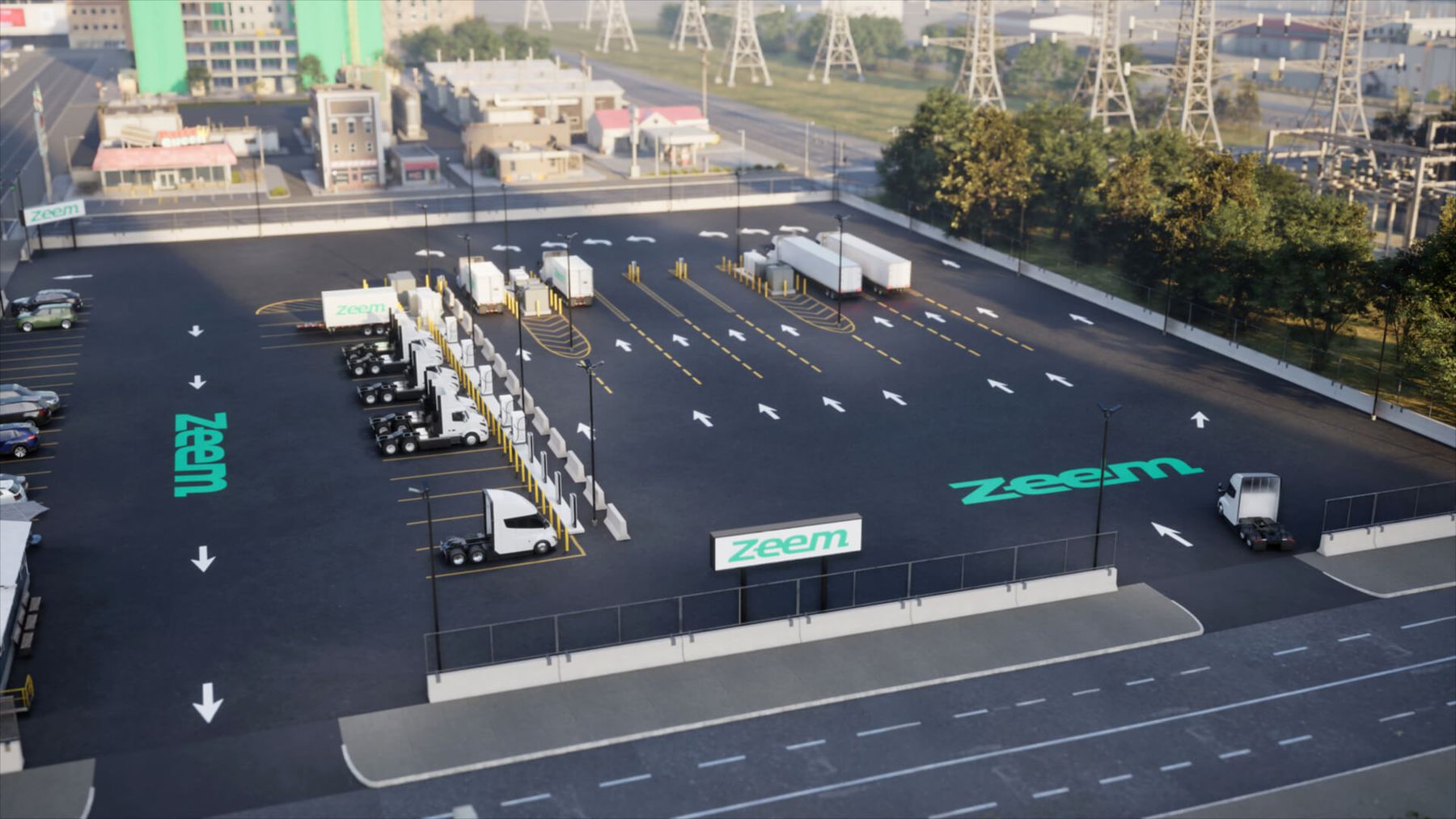 A Zeem depot from above: charging rows, marked traffic lanes and trucks moving through the yard